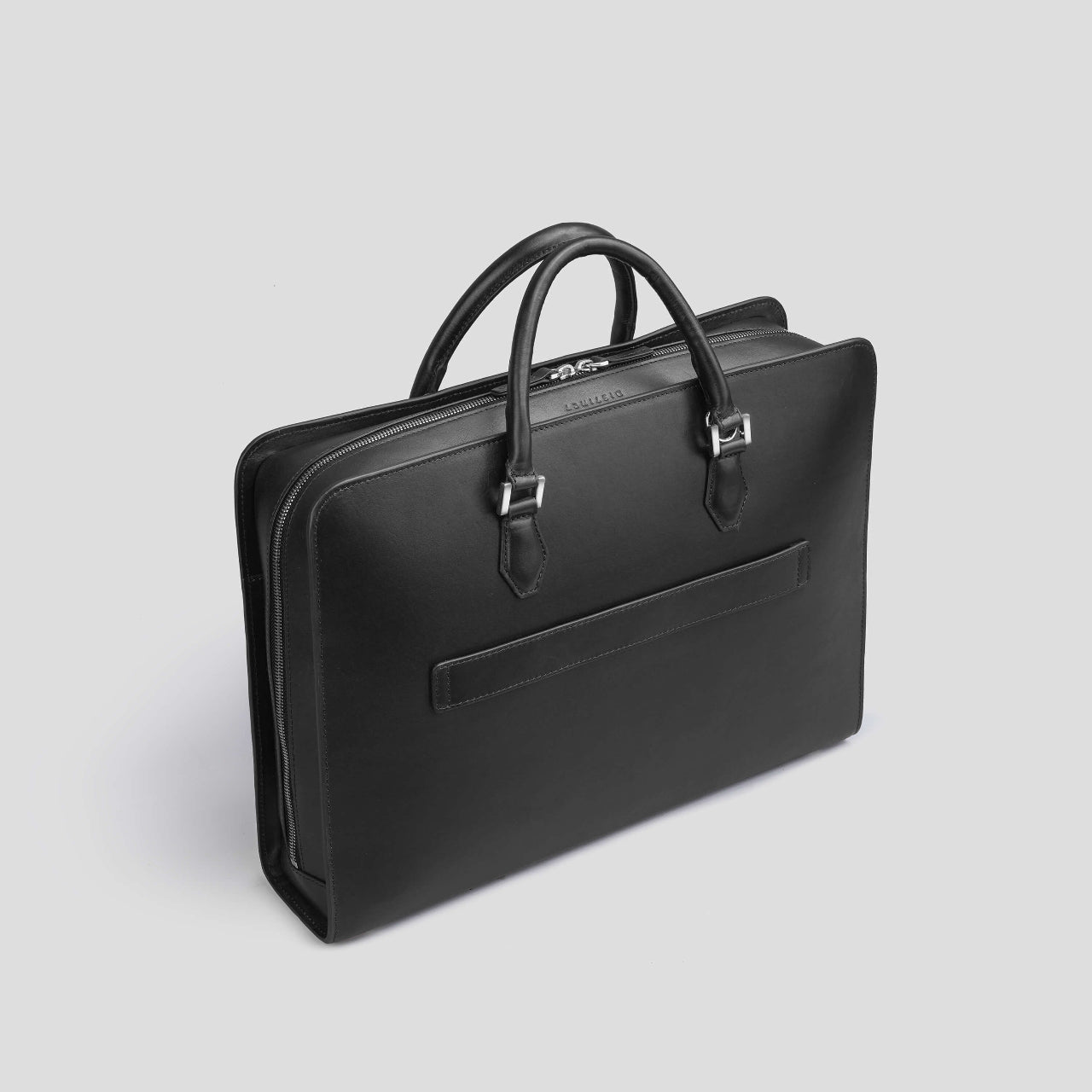 Black leather briefcase from the brand DISTINCT on a light gray background